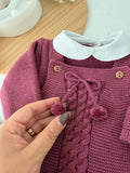 Saída de maternidade beringela pompons