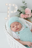 Fofo, blusa gola rendonda e gorro