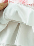 Vestido e touca rosa