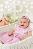 Conjunto plumeti rosa: vestido e fita