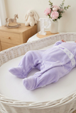 Babygrow lilás em veludo