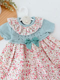 Vestido tema flores e laço 3-12M