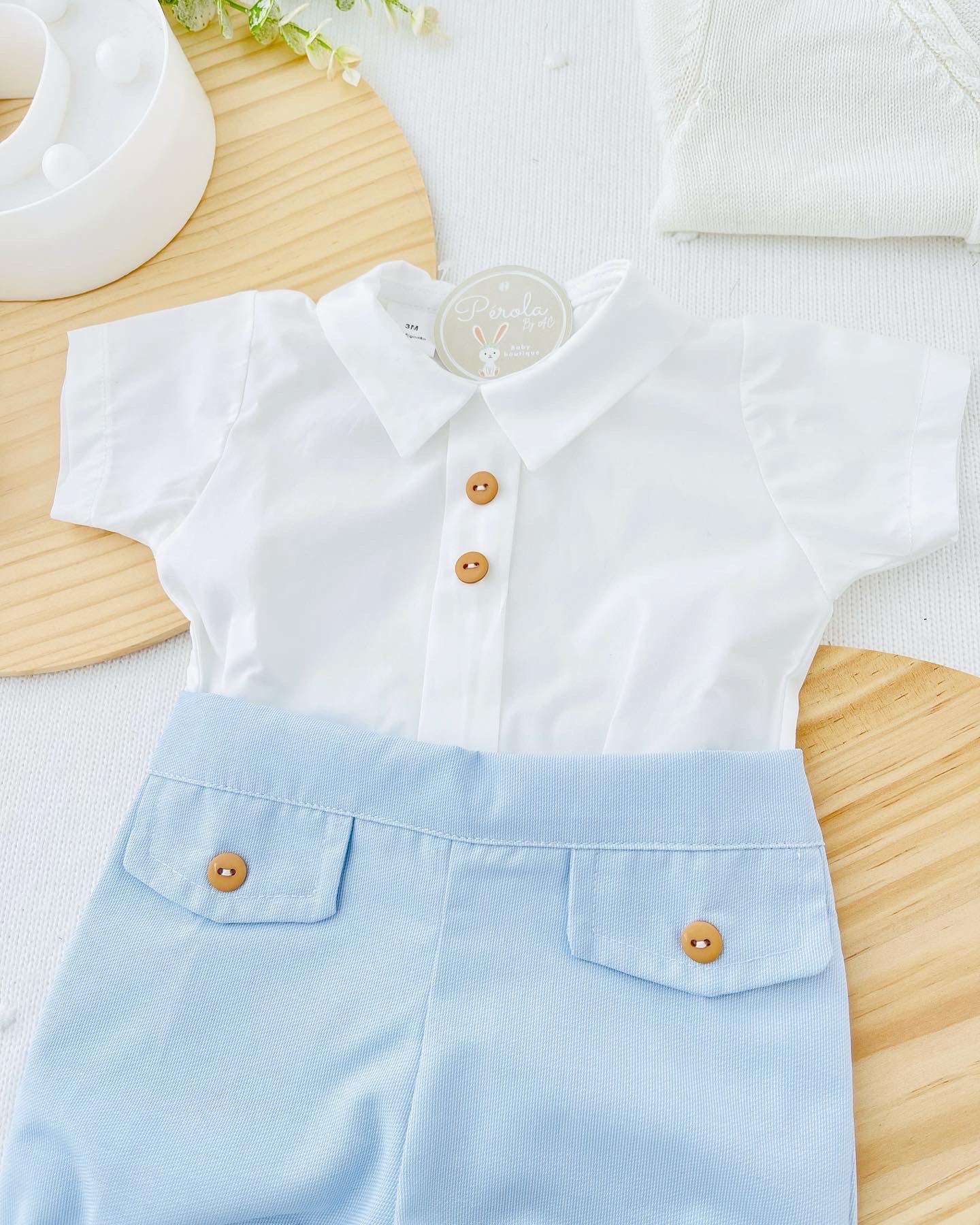 Conjunto: calções e camisa