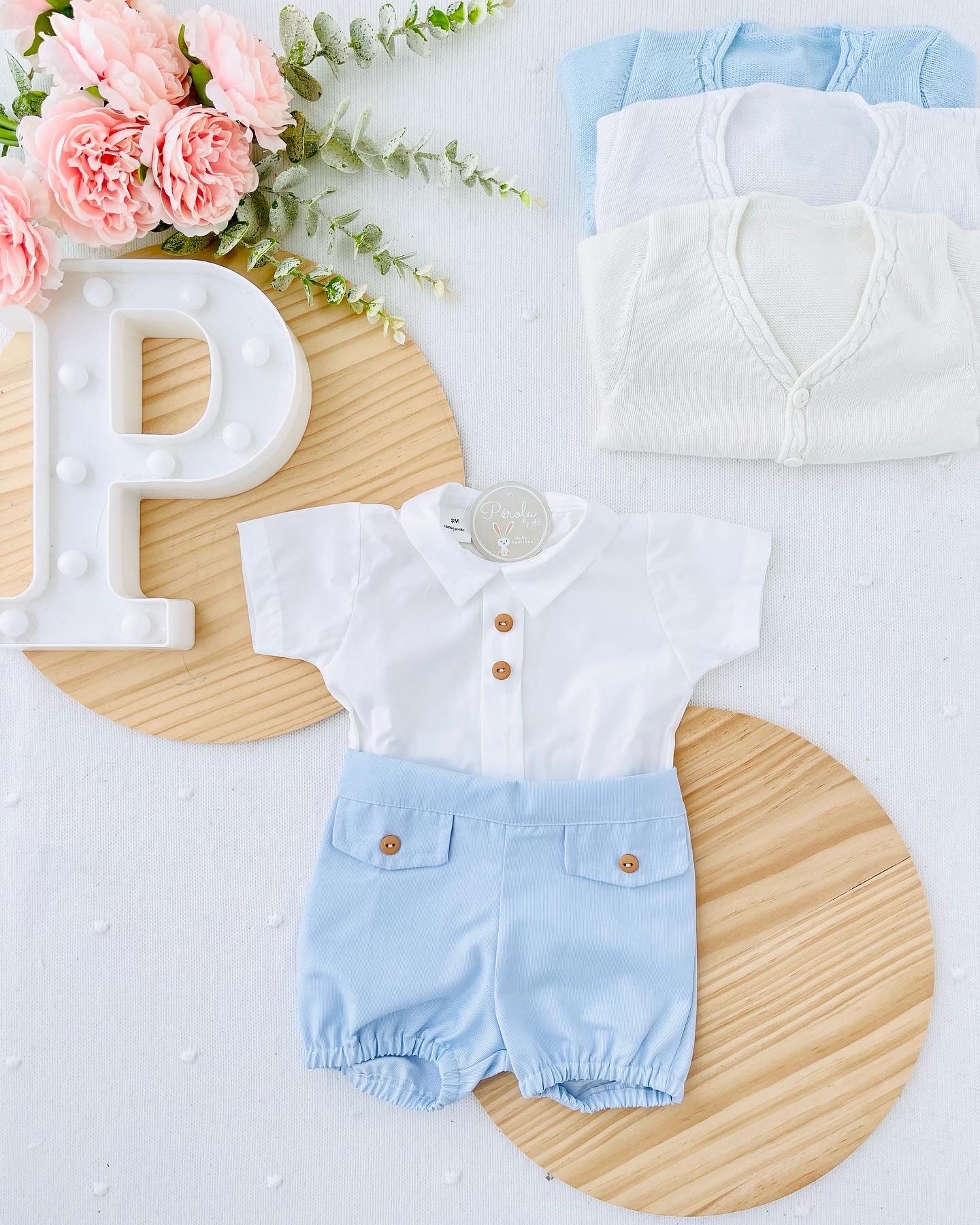 Conjunto: calções e camisa