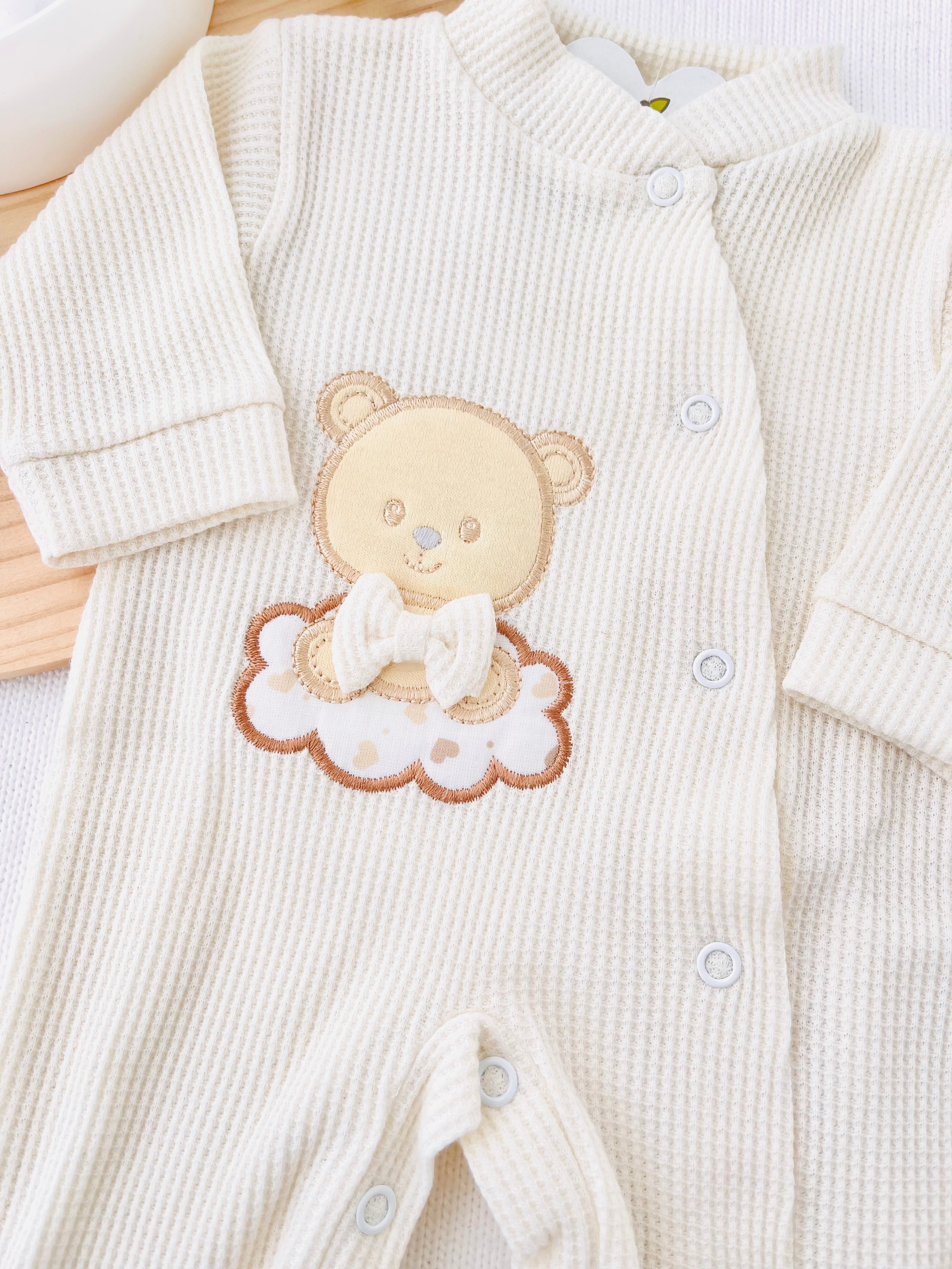 Babygrow ursinho com laço em algodão