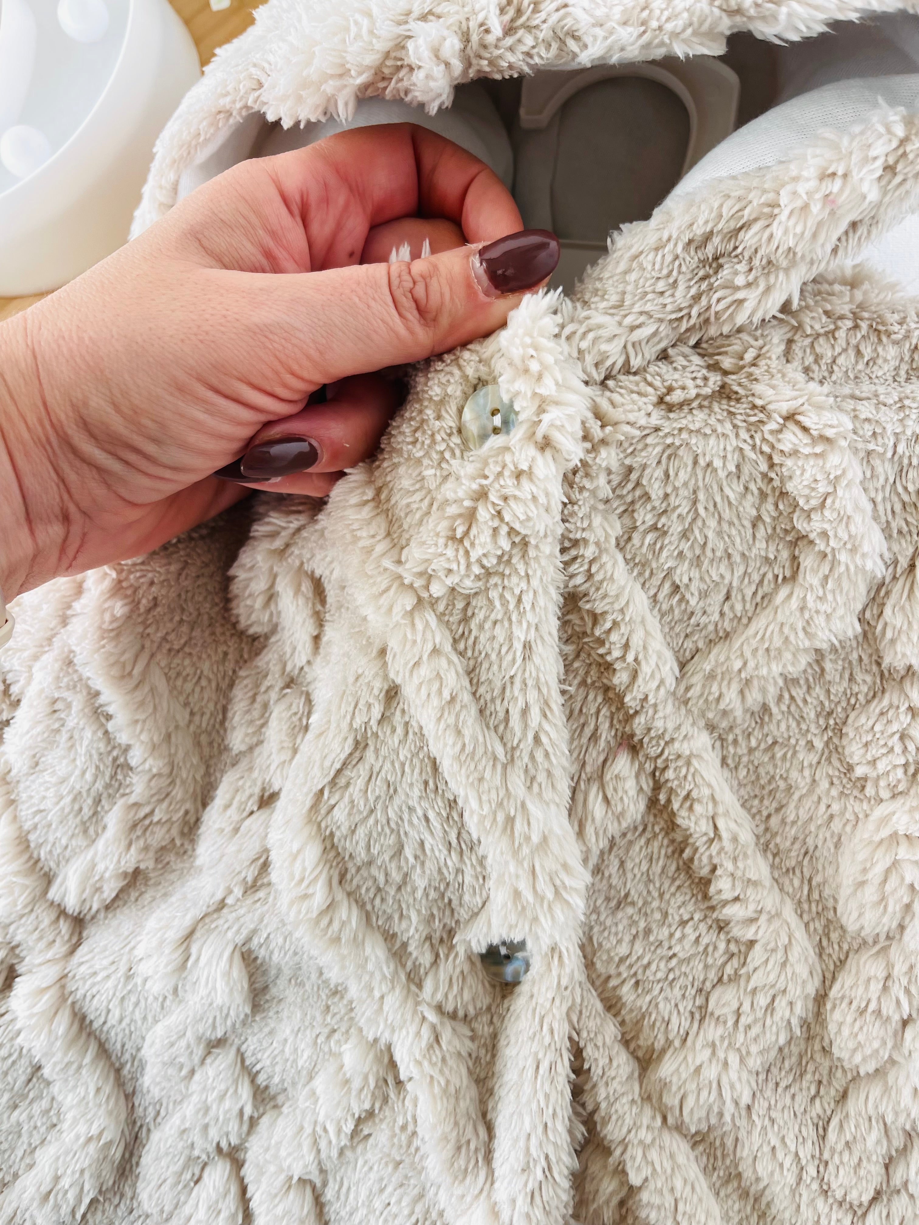 Casaco bege de pêlo muito fofinho