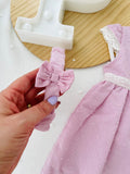 Conjunto plumeti rosa: vestido e fita