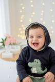 Conjunto dinossauro menino: camisola com capuz e calções