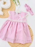 Conjunto plumeti rosa: vestido e fita