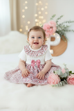 Vestido tema flores e laço 3-12M