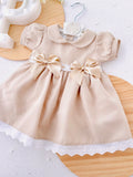 Vestido laços bege
