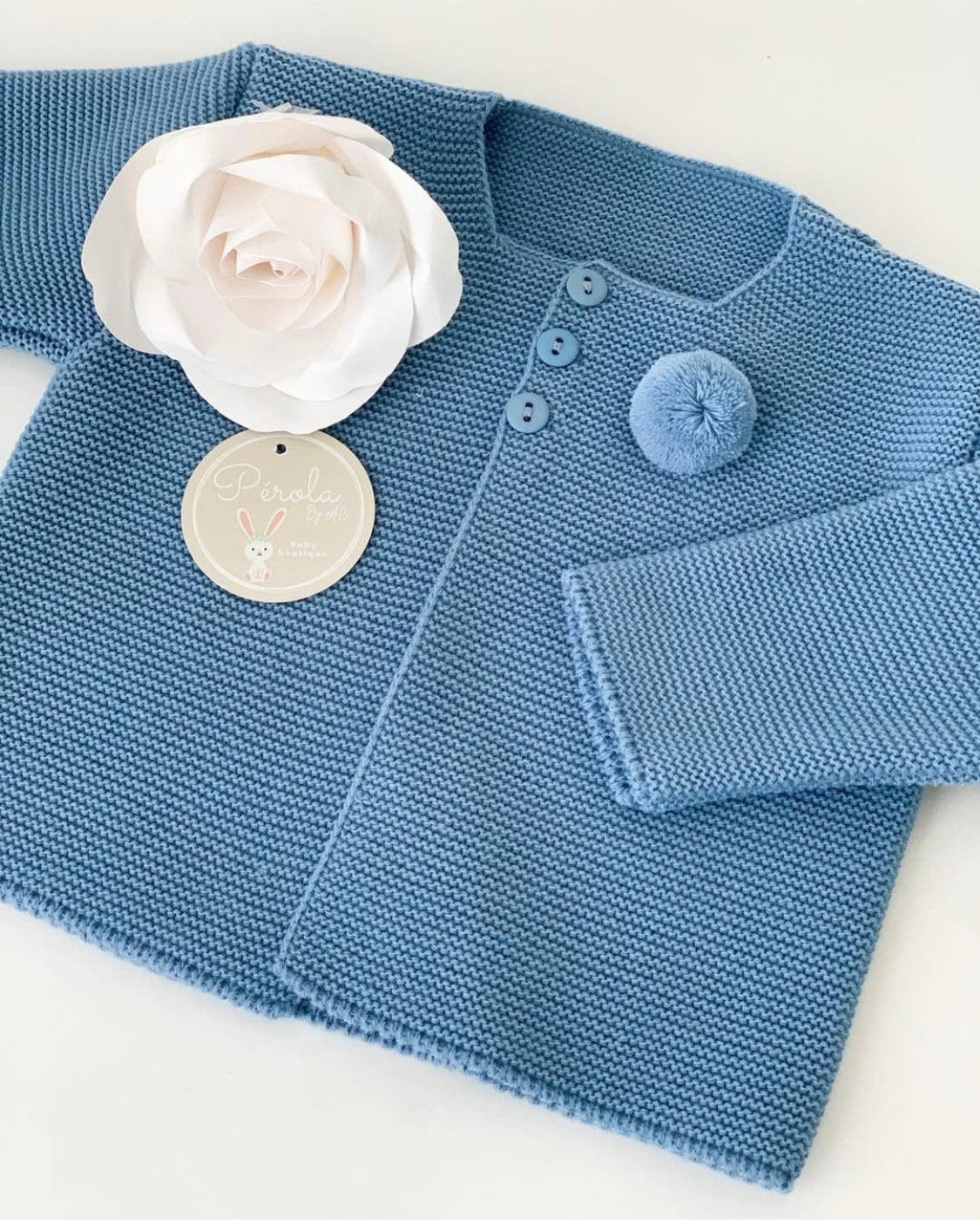 Casaco pompom fofinho