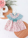 Vestido tema flores e laço 3-12M