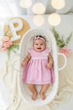 Conjunto plumeti rosa: vestido e fita