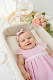 Conjunto plumeti rosa: vestido e fita