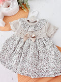 Vestido tema flores e laço 3-12M