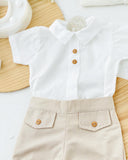 Conjunto: calções e camisa