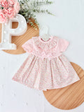 Vestido tema flores e laço 3-12M