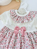 Vestido tema flores e laço 3-12M