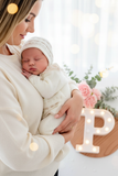 Conjunto princesinha de malha pérola com bordado inglês