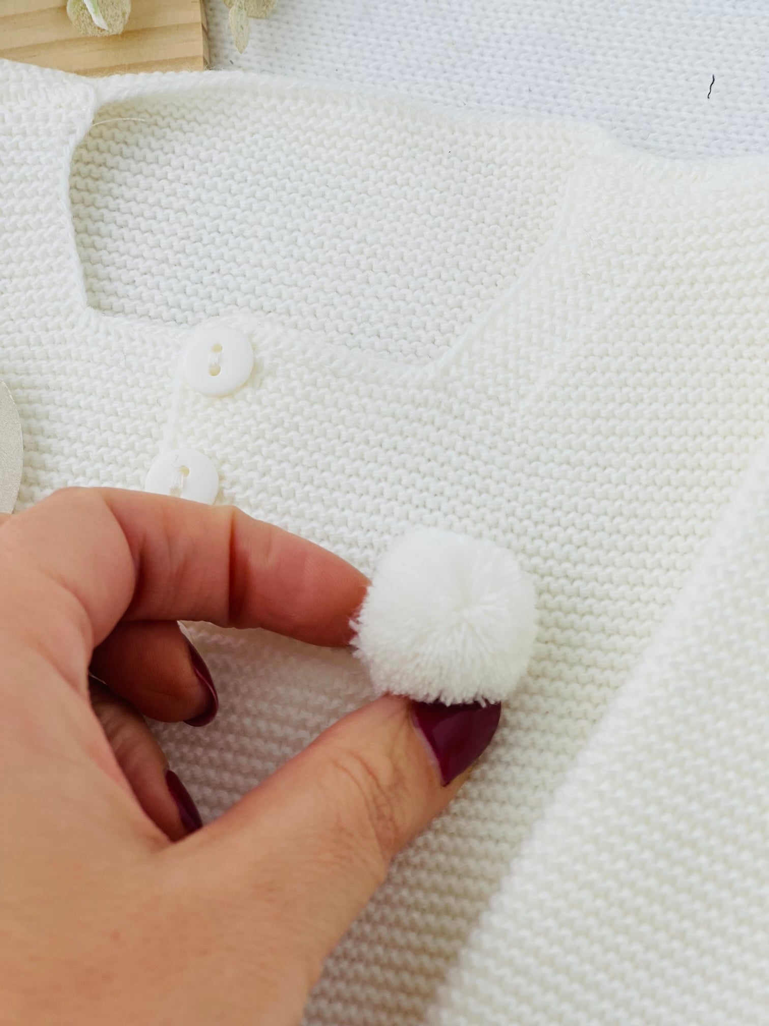 Casaco pompom fofinho