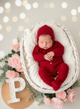 Saída de maternidade vermelho: Babygrow e touca
