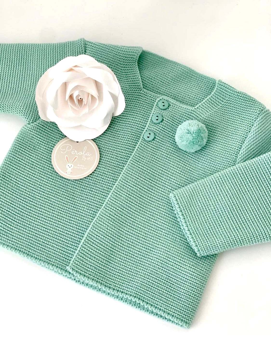 Casaco pompom fofinho