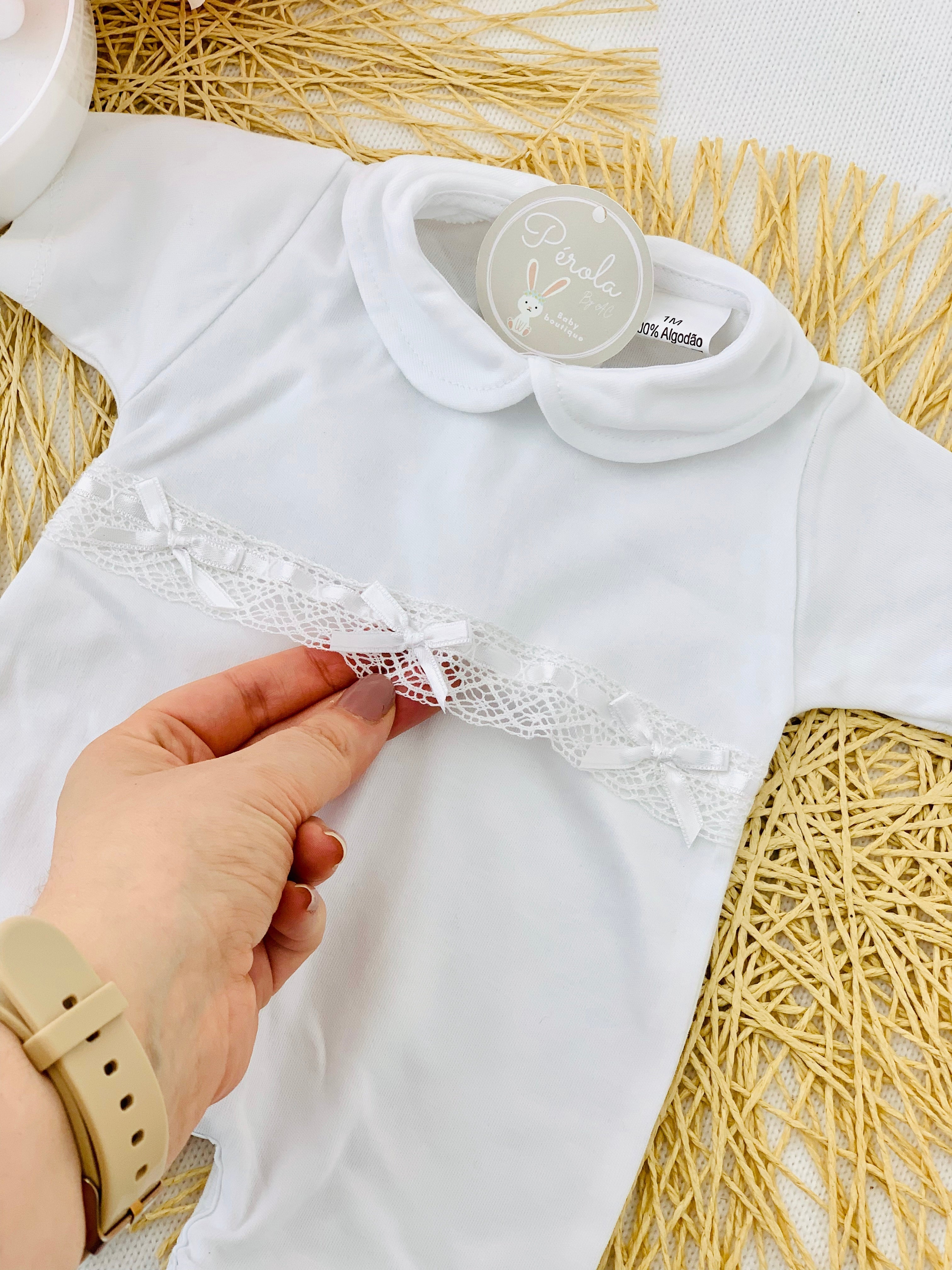 Macacão lacinhos manga curta e sem perna