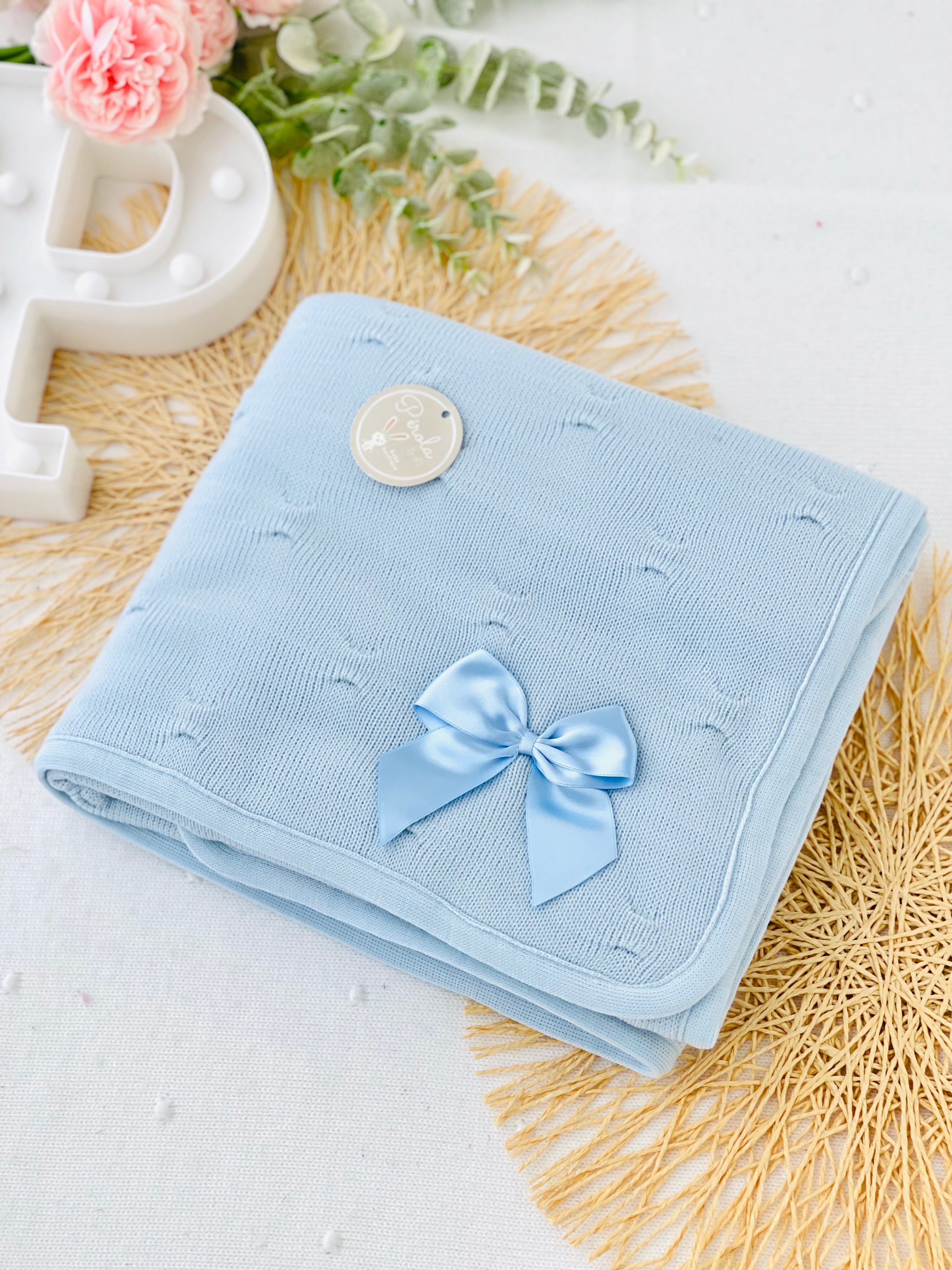 Manta dupla (malha e tecido polar) com laço