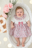 Vestido tema flores e laço 3-12M