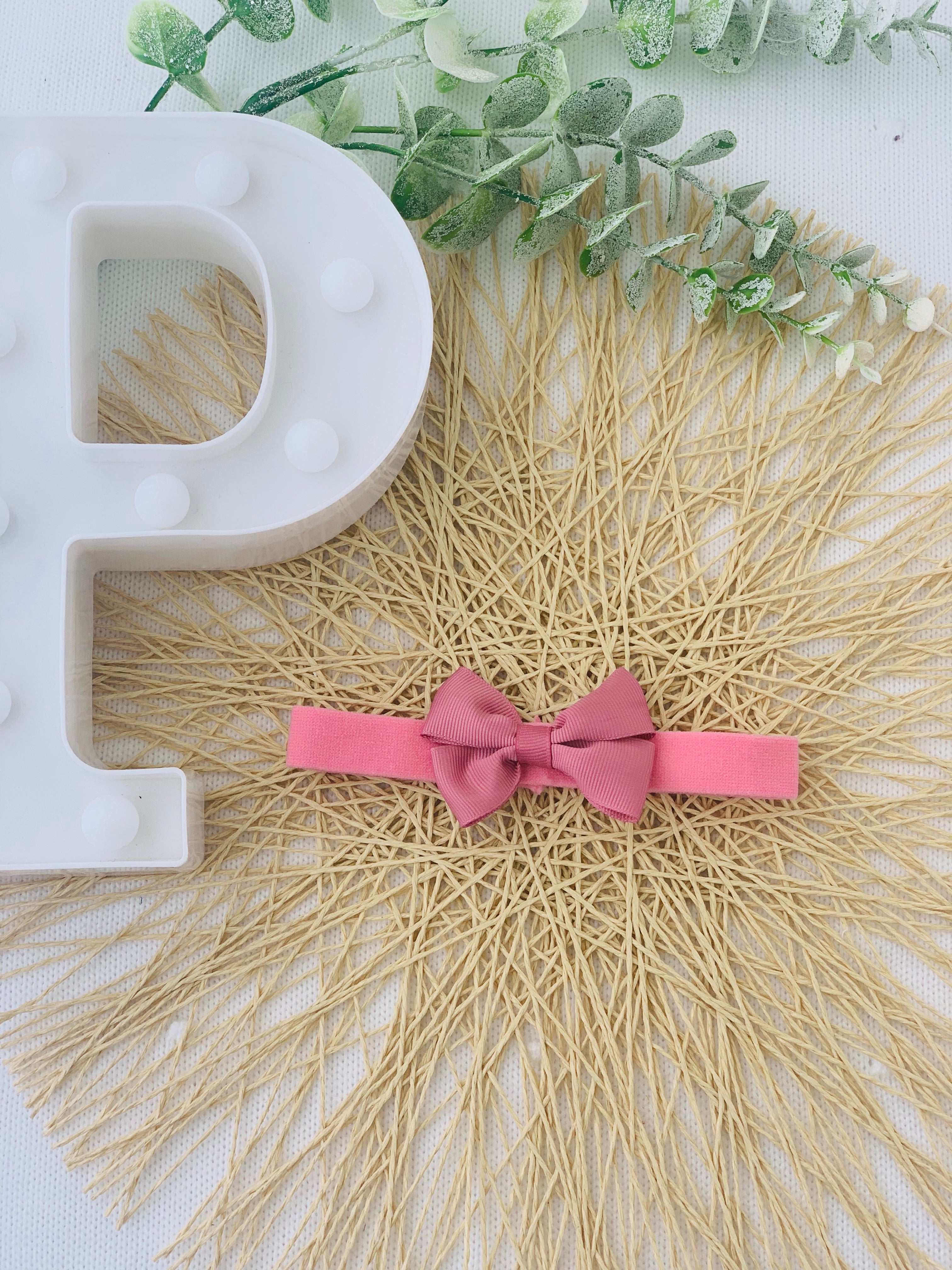 Fita para o cabelo com laço duplo