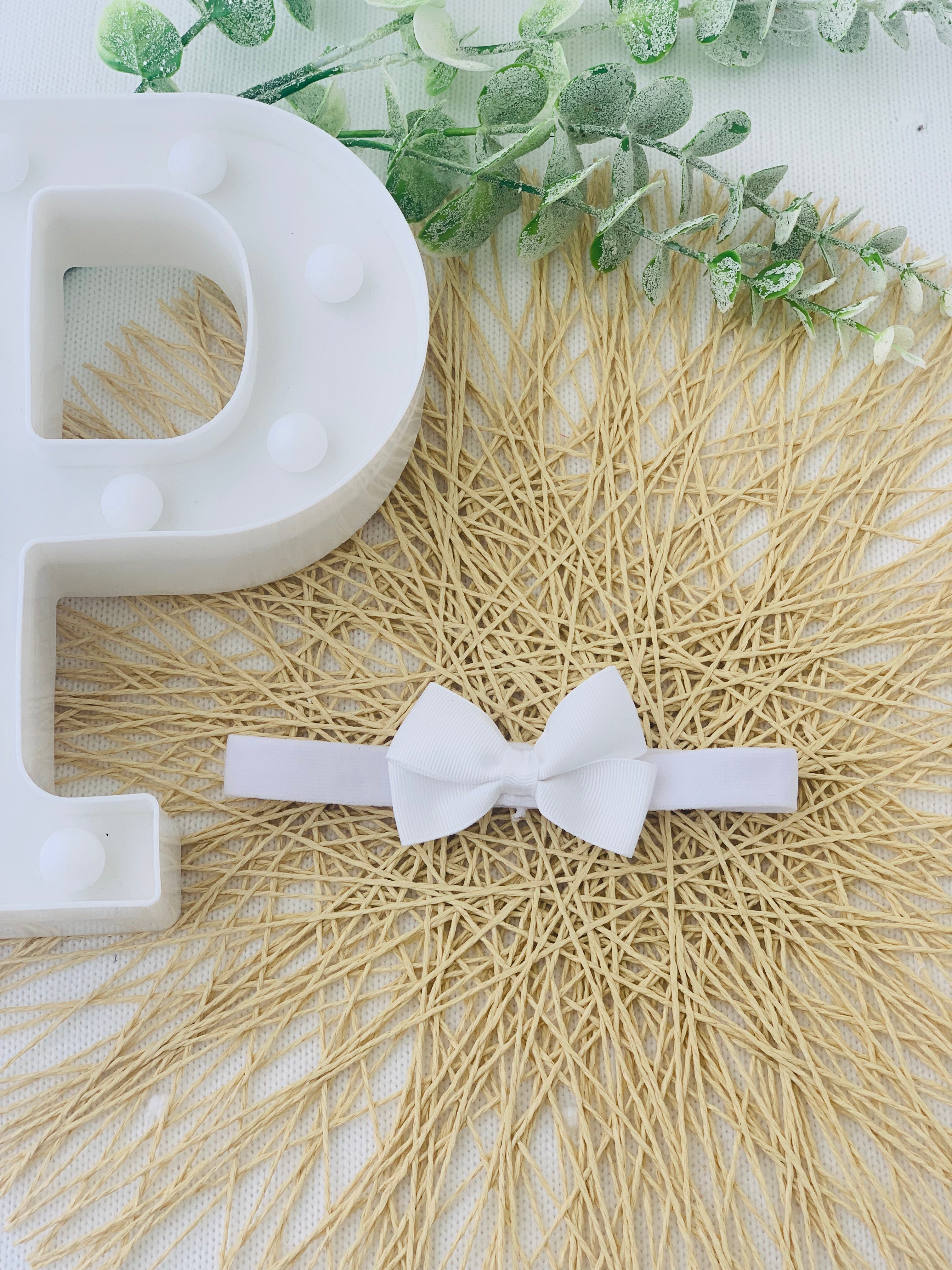 Fita para o cabelo com laço duplo