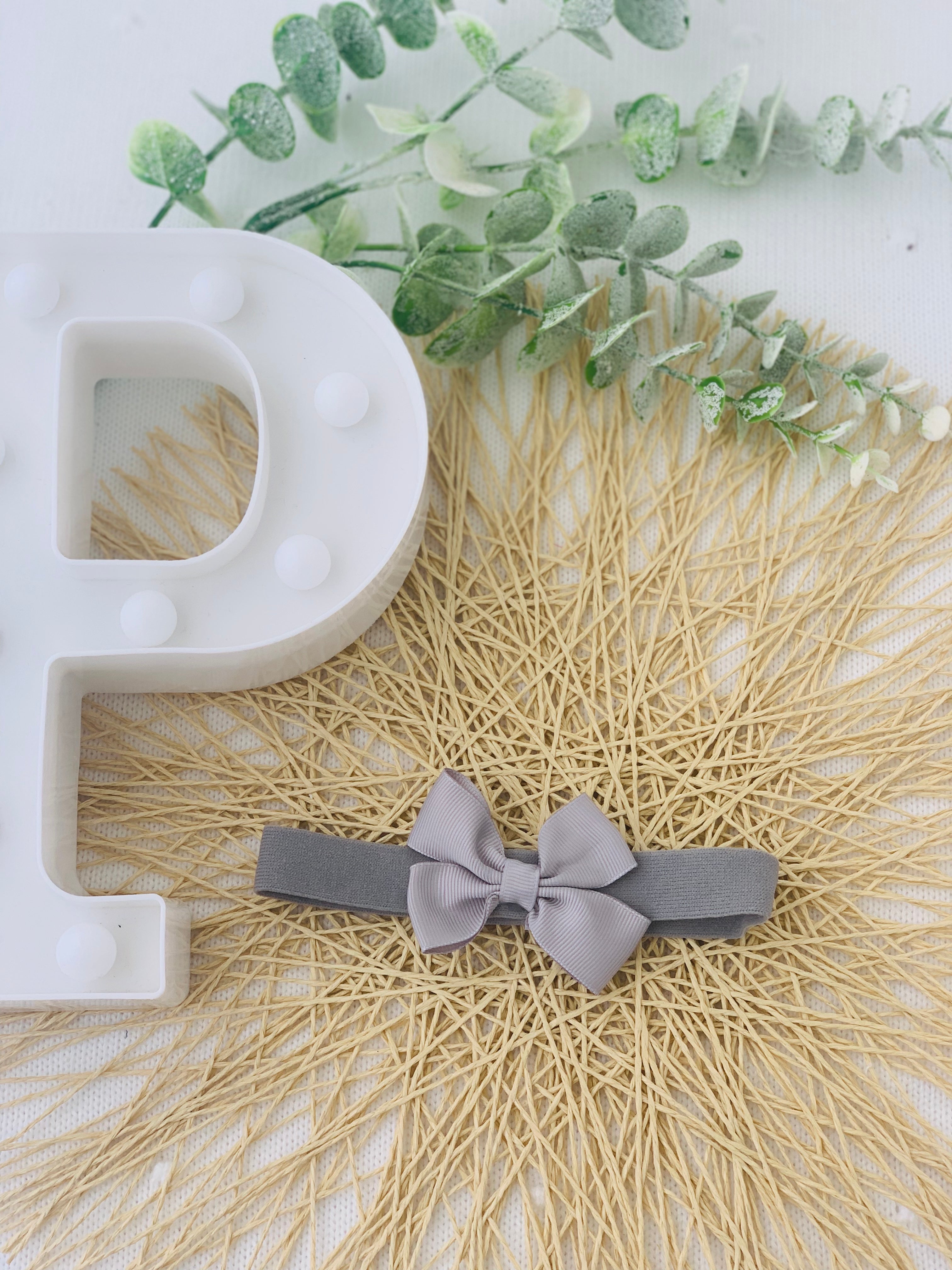 Fita para o cabelo com laço duplo