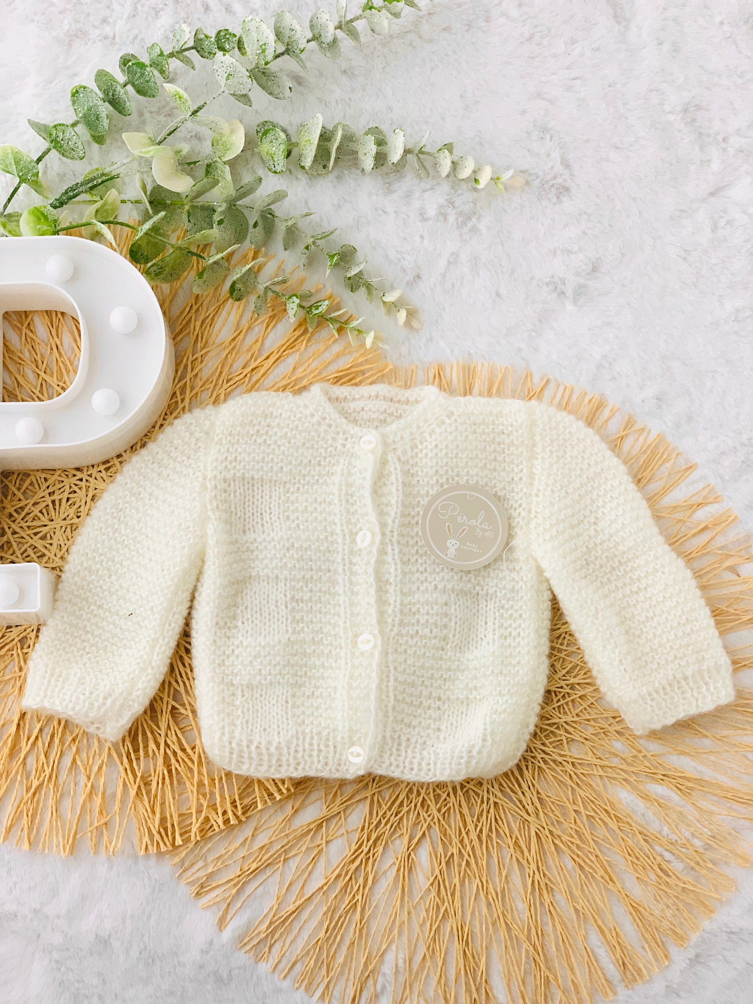 Casaco de malha feito à mão